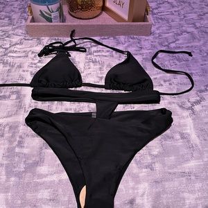 Black Matt Collection Brand 2 piece bikini.  Never worn, liner still in place